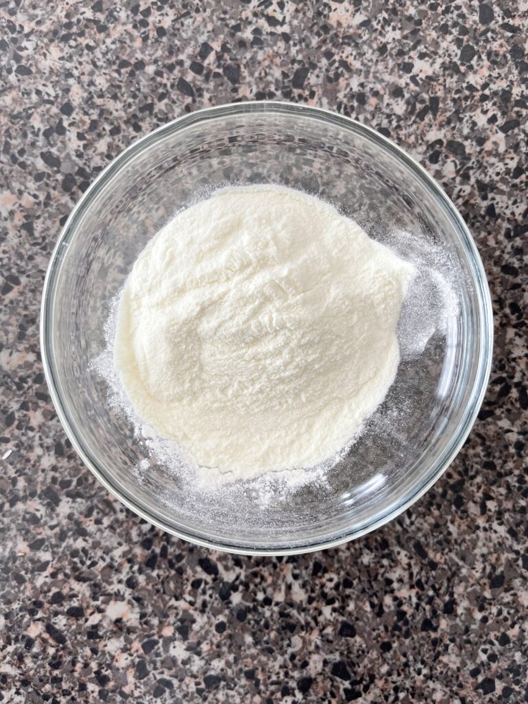 A bowl of powdered milk.
