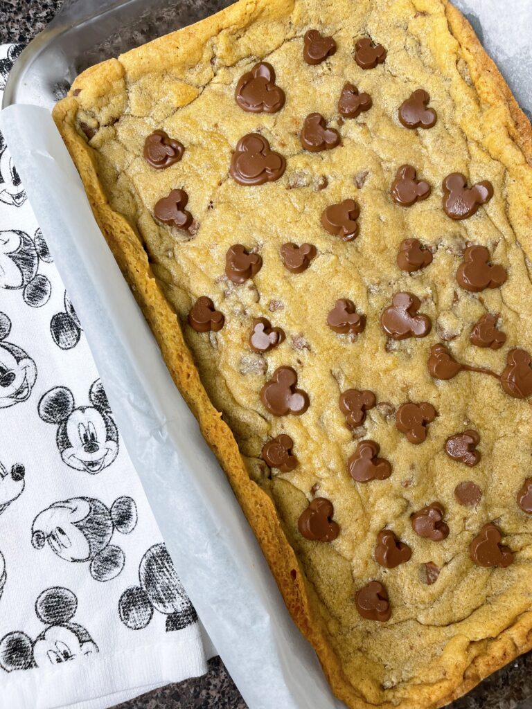 Chocolate chip cookie bars with Mickey Mouse shaped chocolate chips.