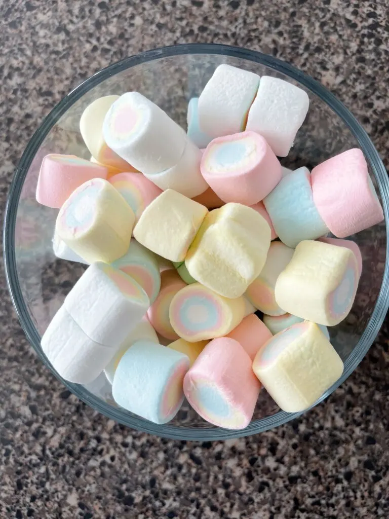 A bowl of rainbow marshmallows.
