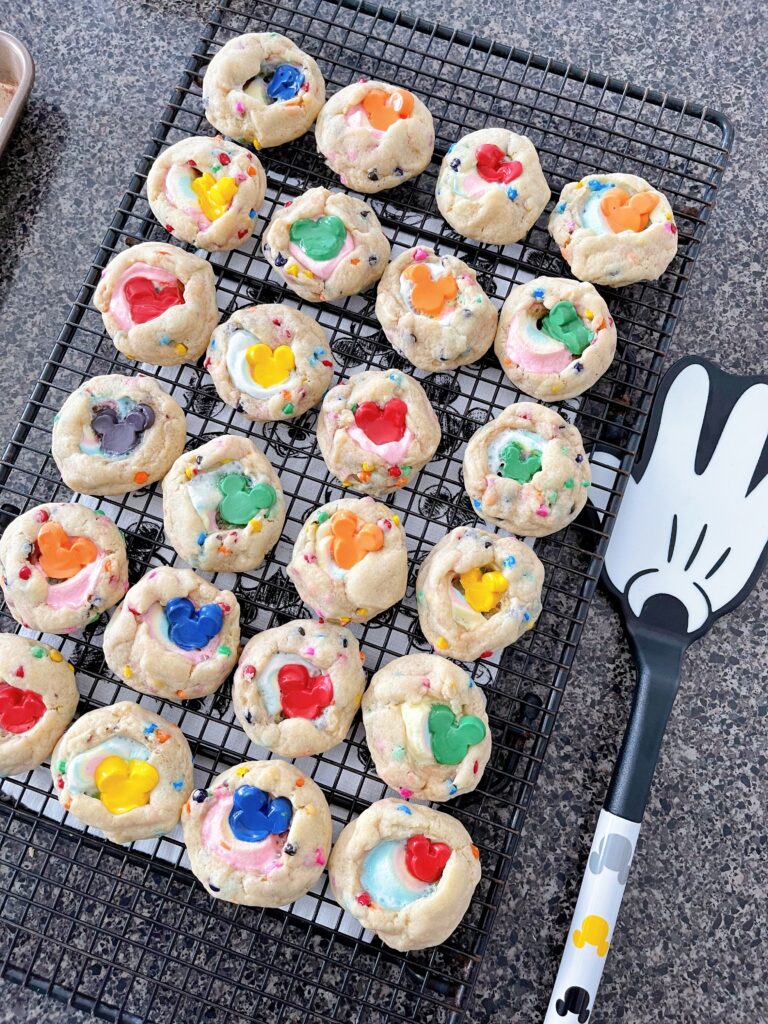 Marshmallow Rainbow Chip Cookies and a Mickey Mouse spatula.