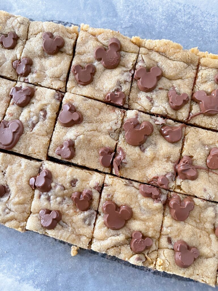 Chocolate chip cookie bars with Mickey Mouse shaped chocolate chips.