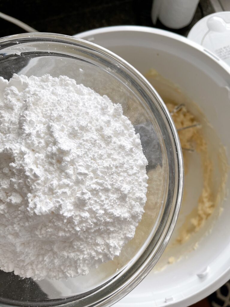 A bowl of powdered sugar to make frosting.