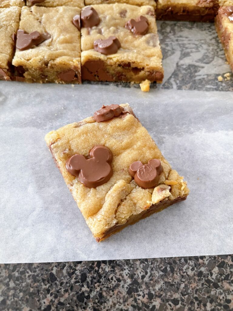 Chocolate chip cookie bars with Mickey Mouse shaped chocolate chips.