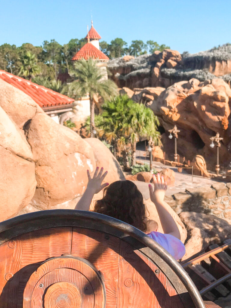 Riding on Seven Dwarfs Mine Train at Disney World's Magic Kingdom.