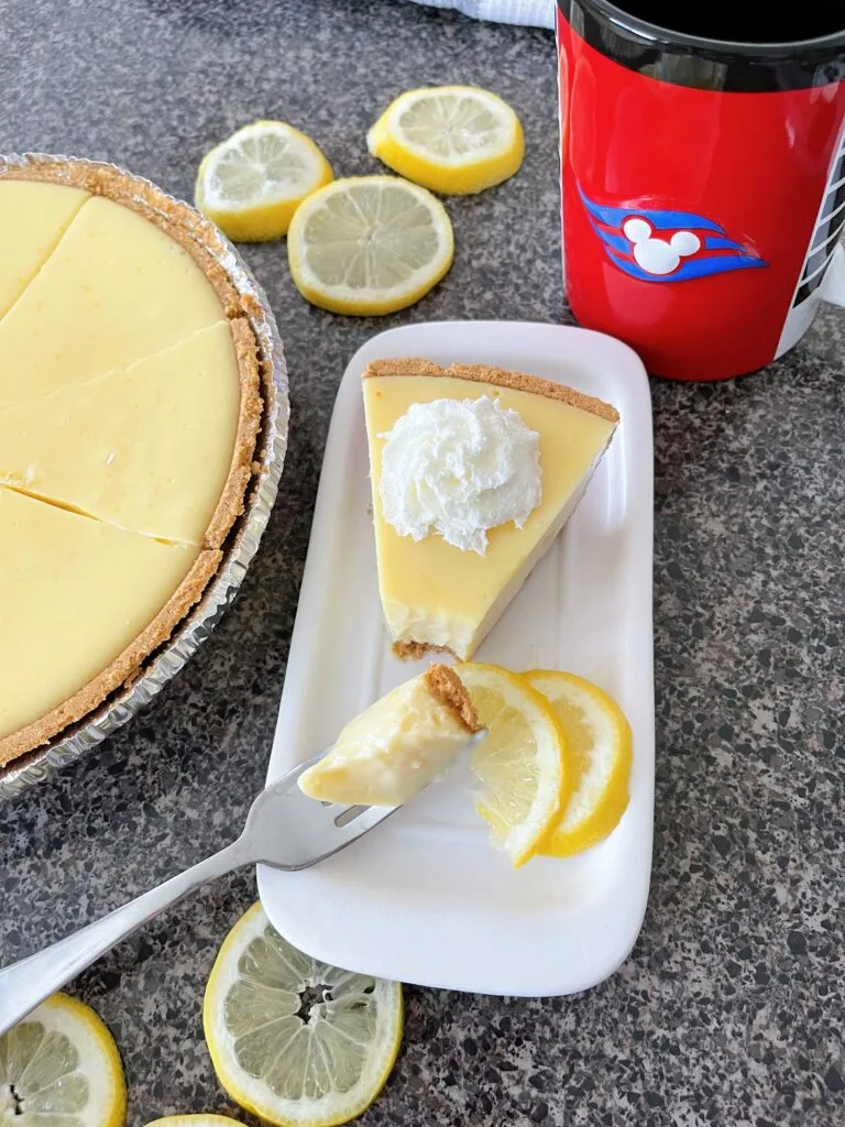 A lemon icebox pie and a Disney Cruise Line mug.