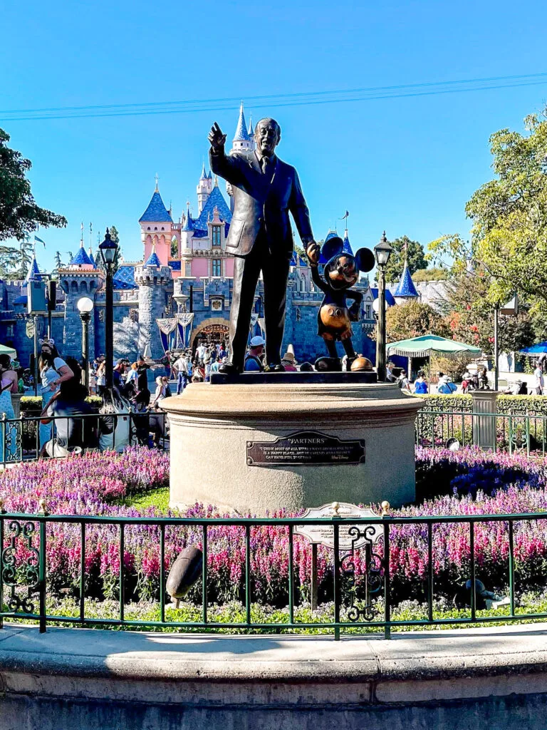 Walt Disney and Mickey Mouse statue at Disneyland.