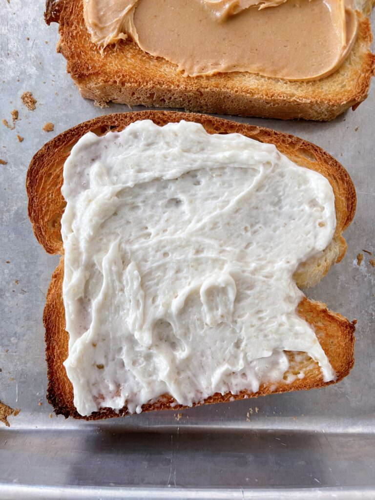 Whipped honey butter spread on bread toasted in the oven.