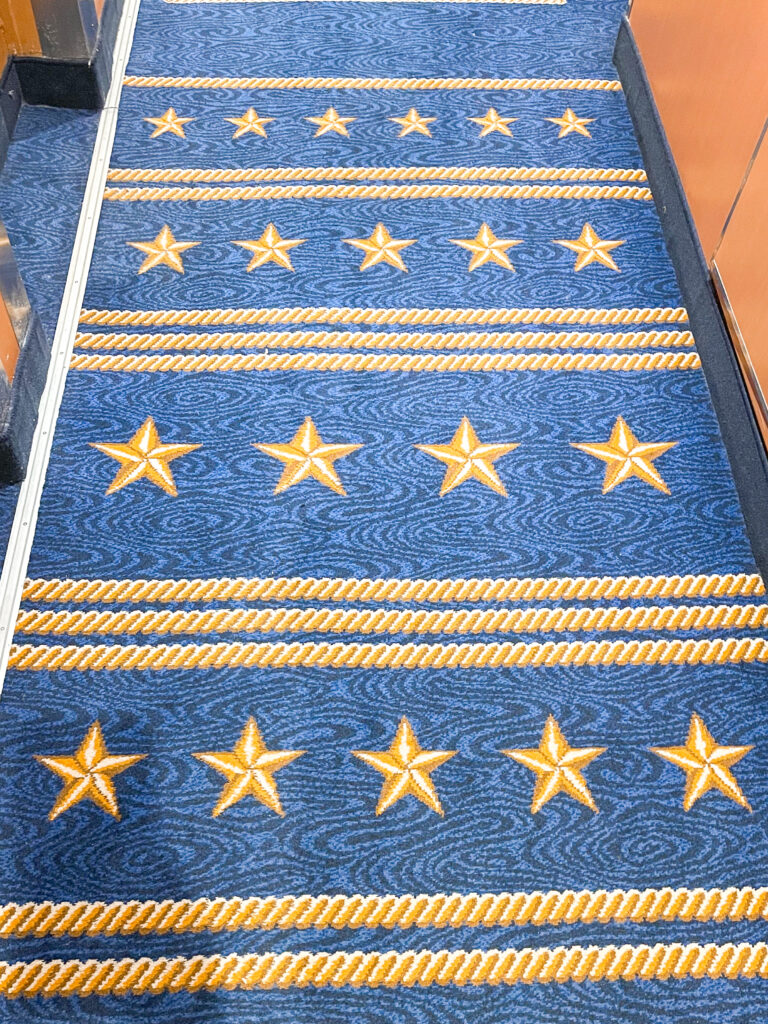 Disney Cruise Line carpet in the hallway.