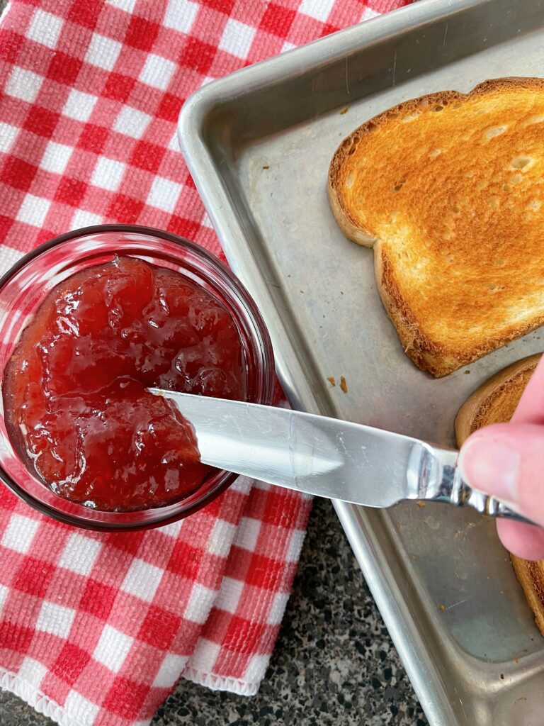 Strawberry jam and oven toast.