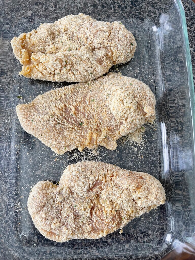 Chicken coated in breadcrumbs and parmesan.