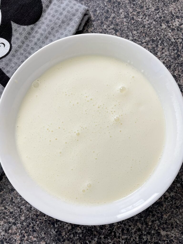 French toast batter in a shallow bowl.