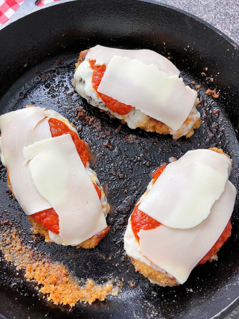 Chicken parmesan topped with mozzarella.