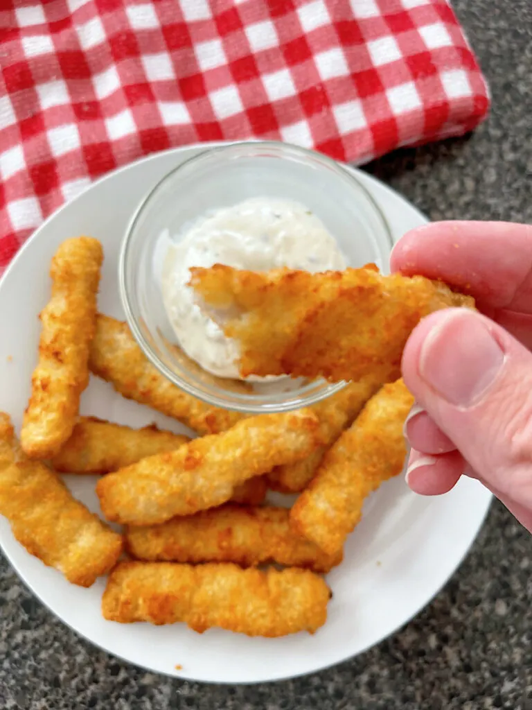 A fish stick cooked in an air fryer for 10 minutes at 400 degrees.