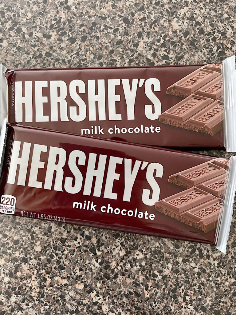 Two Hershey's milk chocolate candy bars.