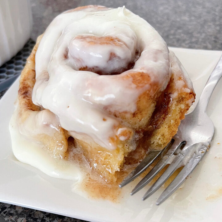 A TikTok cinnamon roll made with heavy cream and extra frosting.