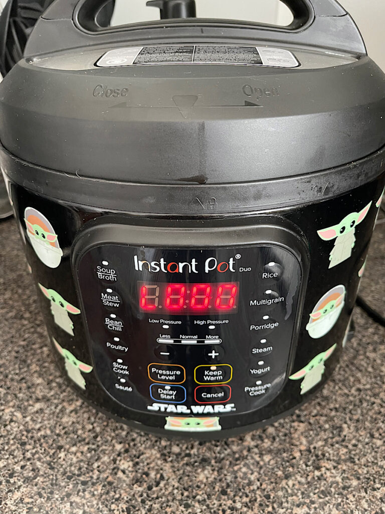 An Instant pot set to natural release when making overnight steel cut oats.
