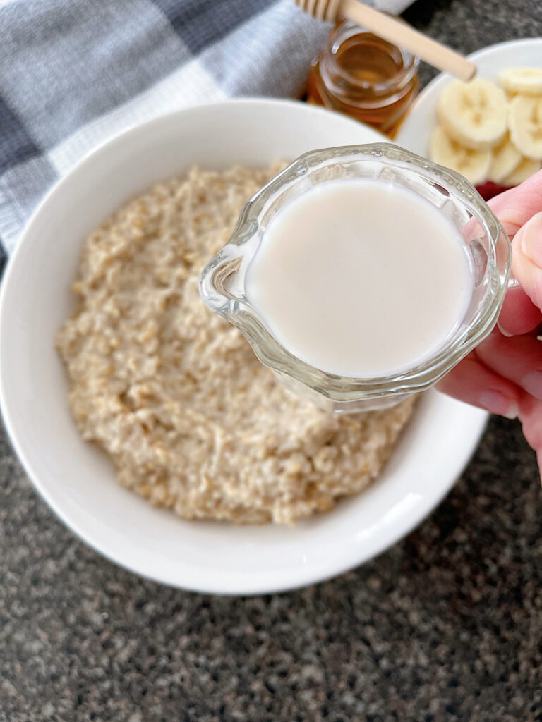 Milk poured over steel cut oatmeal cooked in an instant pot.