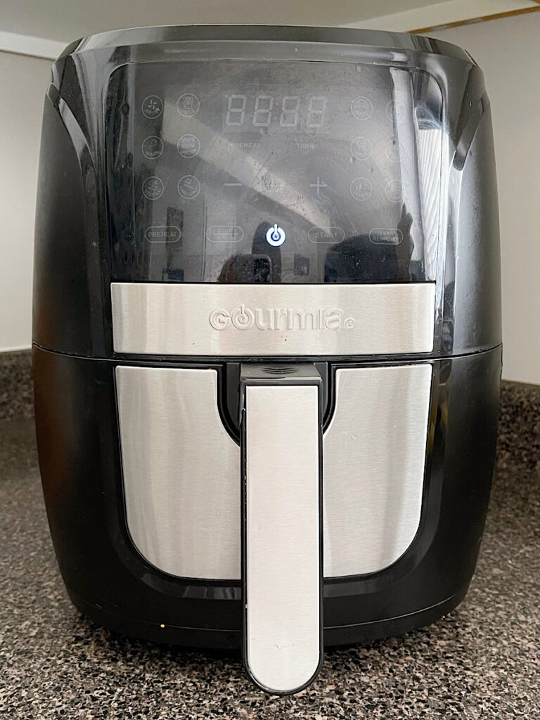 An air fryer on a kitchen counter.