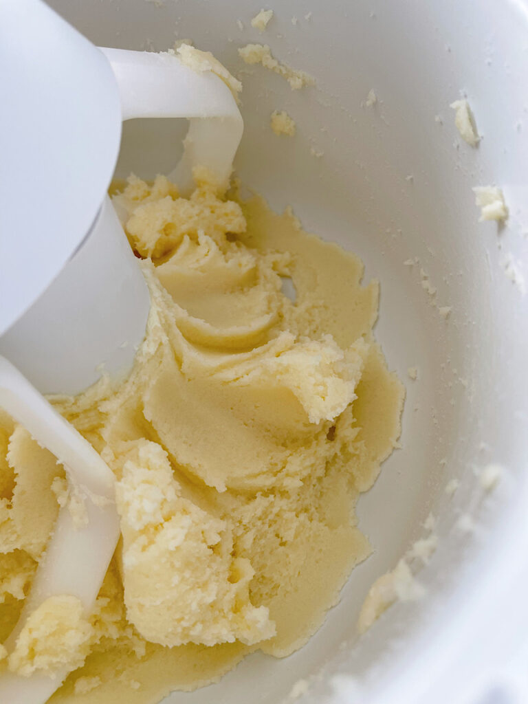 Butter and sugar mixed together in a stand mixer.