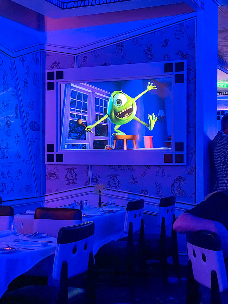 Disney characters on the screen in Animator's Palate.