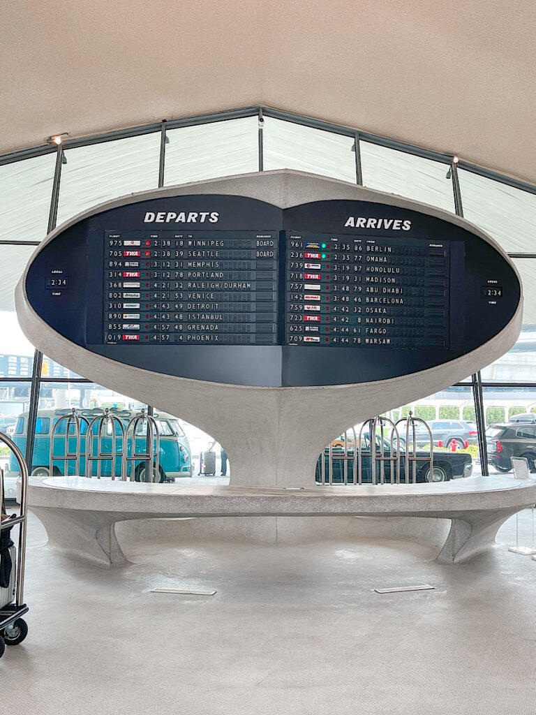 Vintage Departures and Arrival Times sign inside the TWA Hotel.