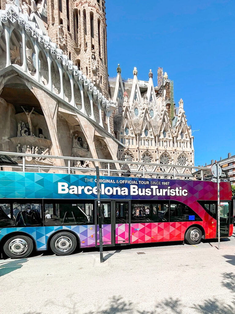 Hop on Hop off Bus tour of Barcelona in front of La Sagrada Familia.