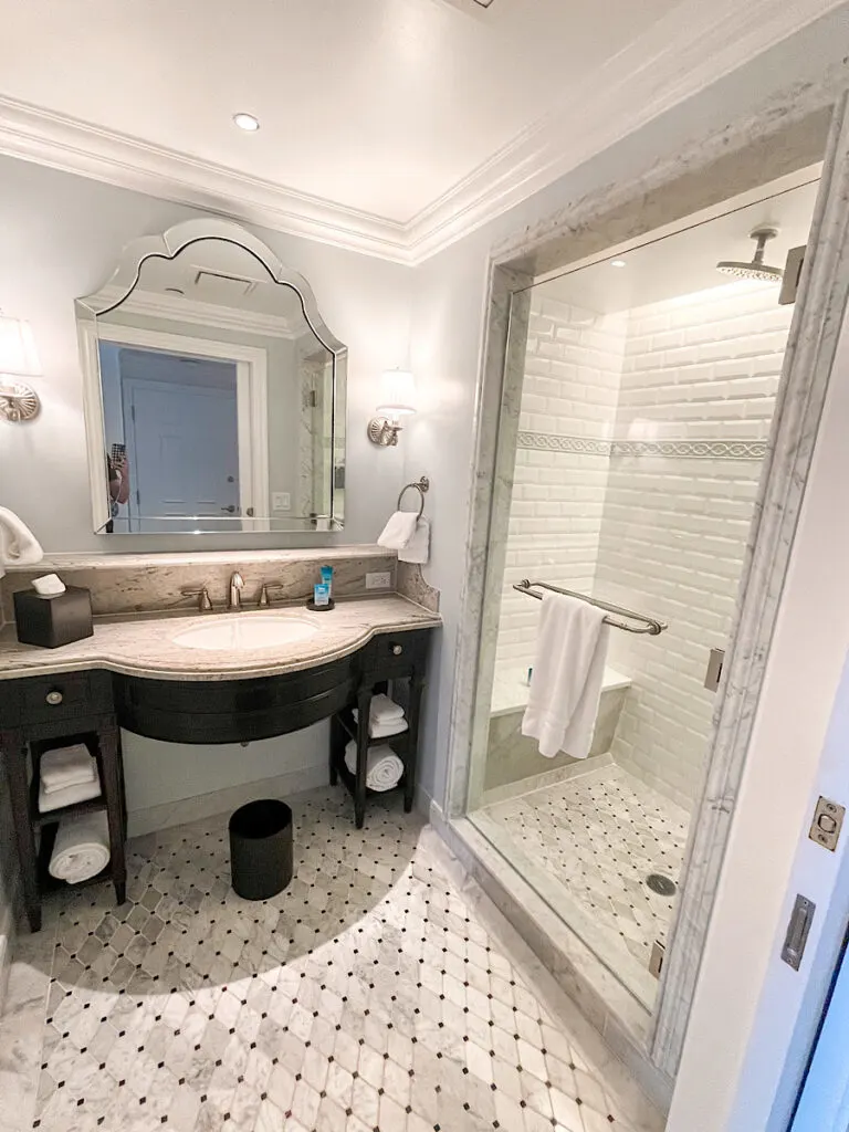 Bathroom with a vanity and stand up shower.