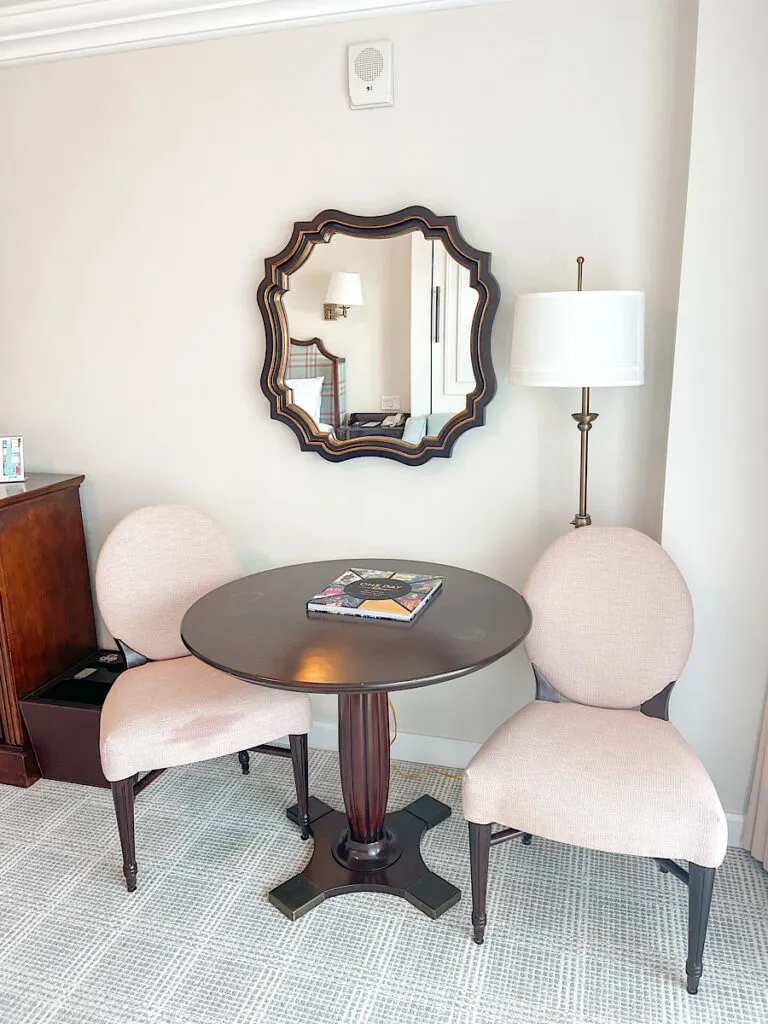 Table and chairs in a Grand Floridian hotel room.