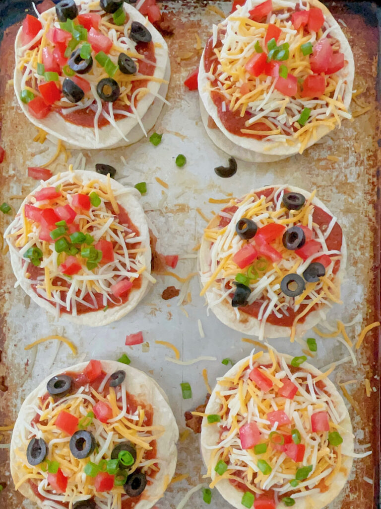 Homemade Mexican Pizzas on a baking sheet.