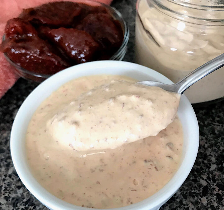 A spoonful of taco bell chipotle sauce.