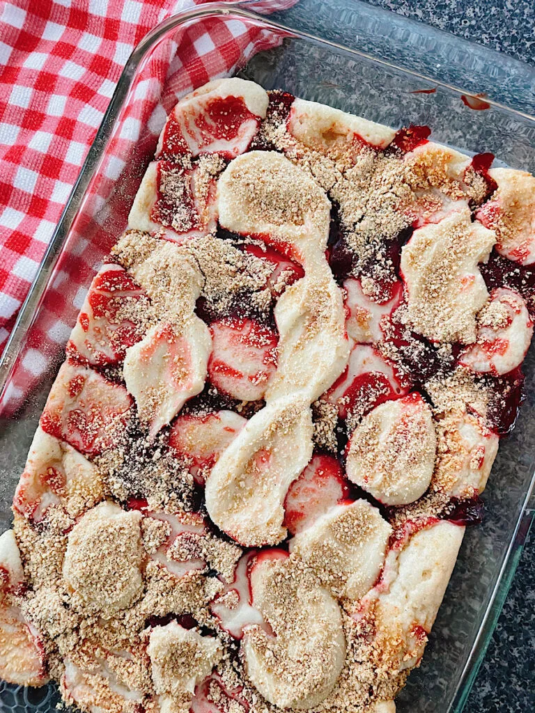 Strawberry dump cake in a baking dish.