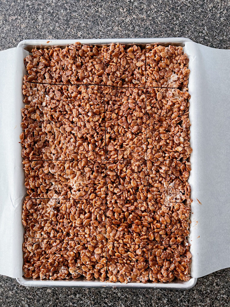 A pan full of chocolate rice crispy treats.