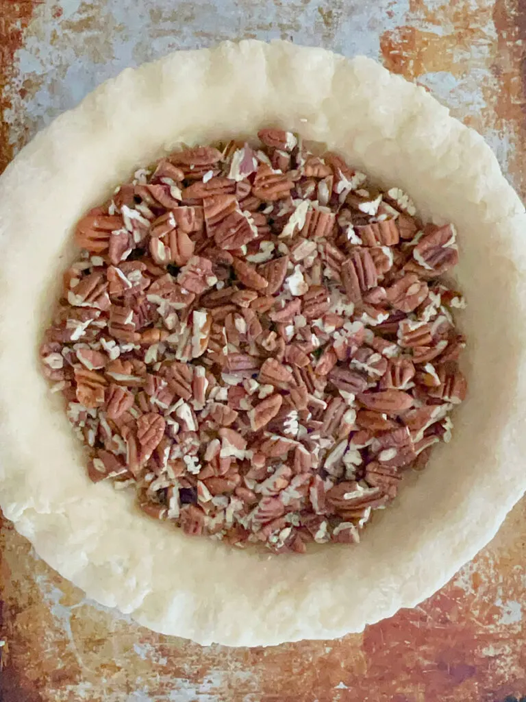 Pecans in a pie crust.