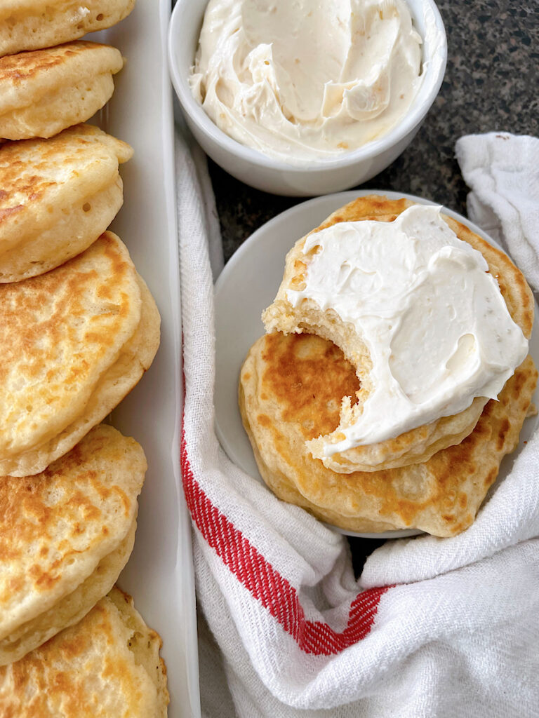 The Queen's favorite dropped scones next to a dish of whipped honey butter.