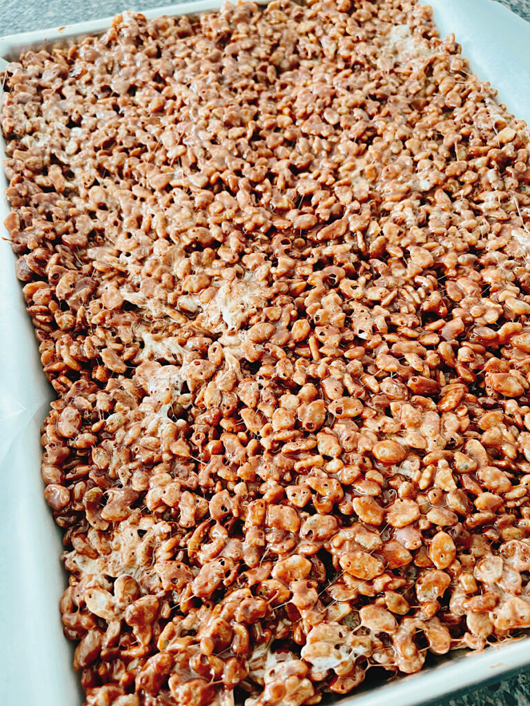 A pan full of chocolate rice crispy treats.