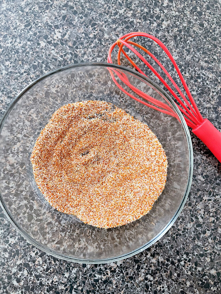 A bowl of spices for air fryer sweet potato fries.