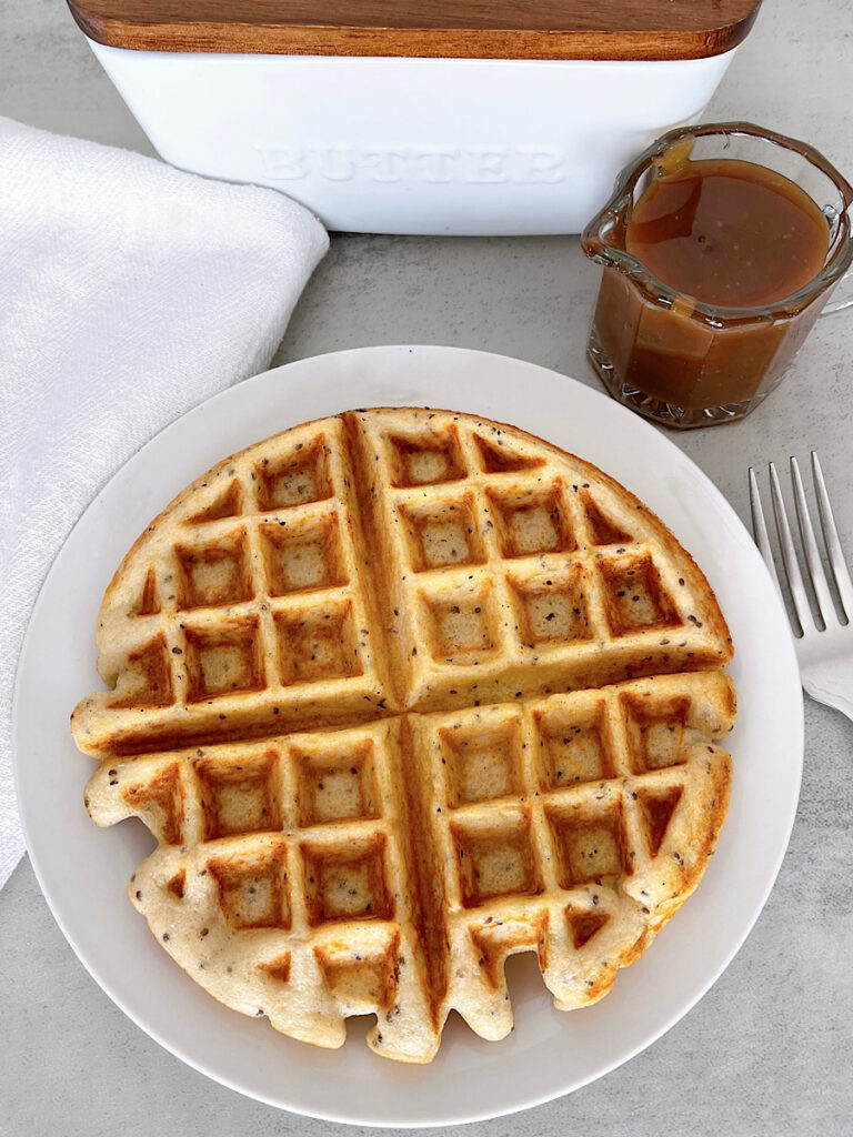 A Kodiak Protein waffle on a white plate.