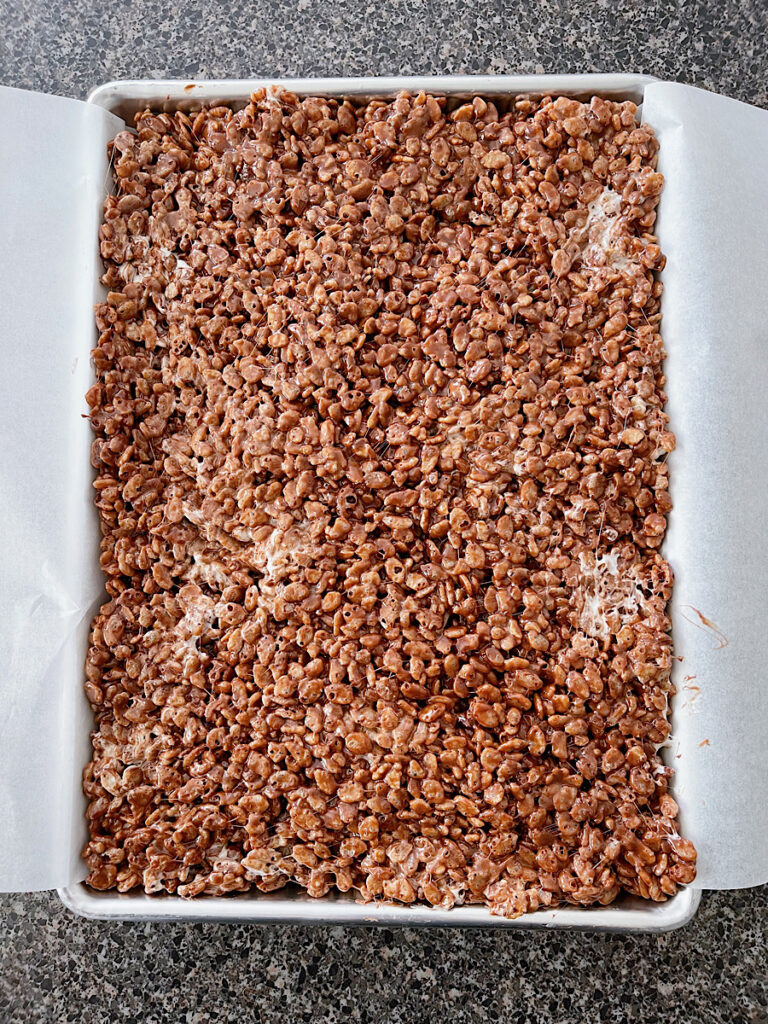 A pan full of chocolate rice crispy treats.