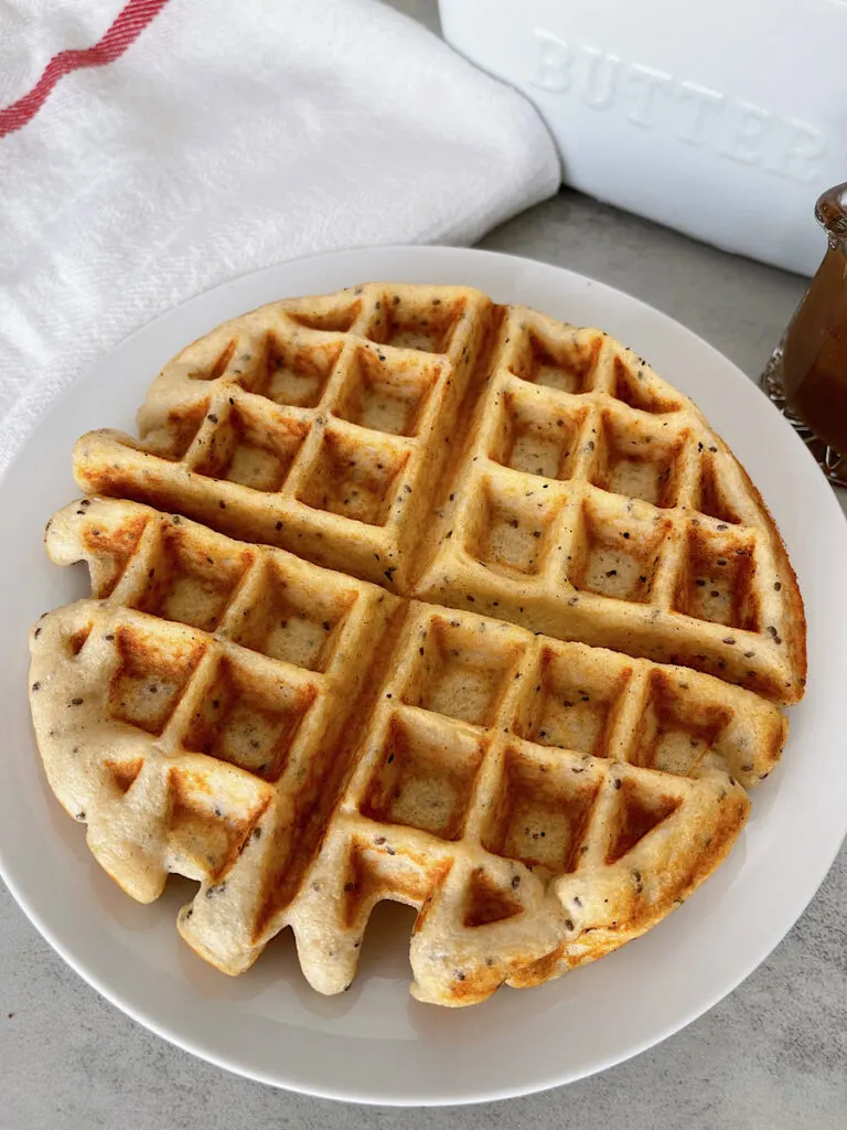 A Kodiak Protein waffle on a white plate.