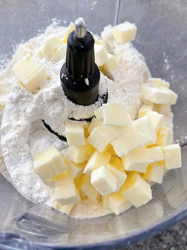 Butter cut into cubes about to be cut into flour for pie crust.