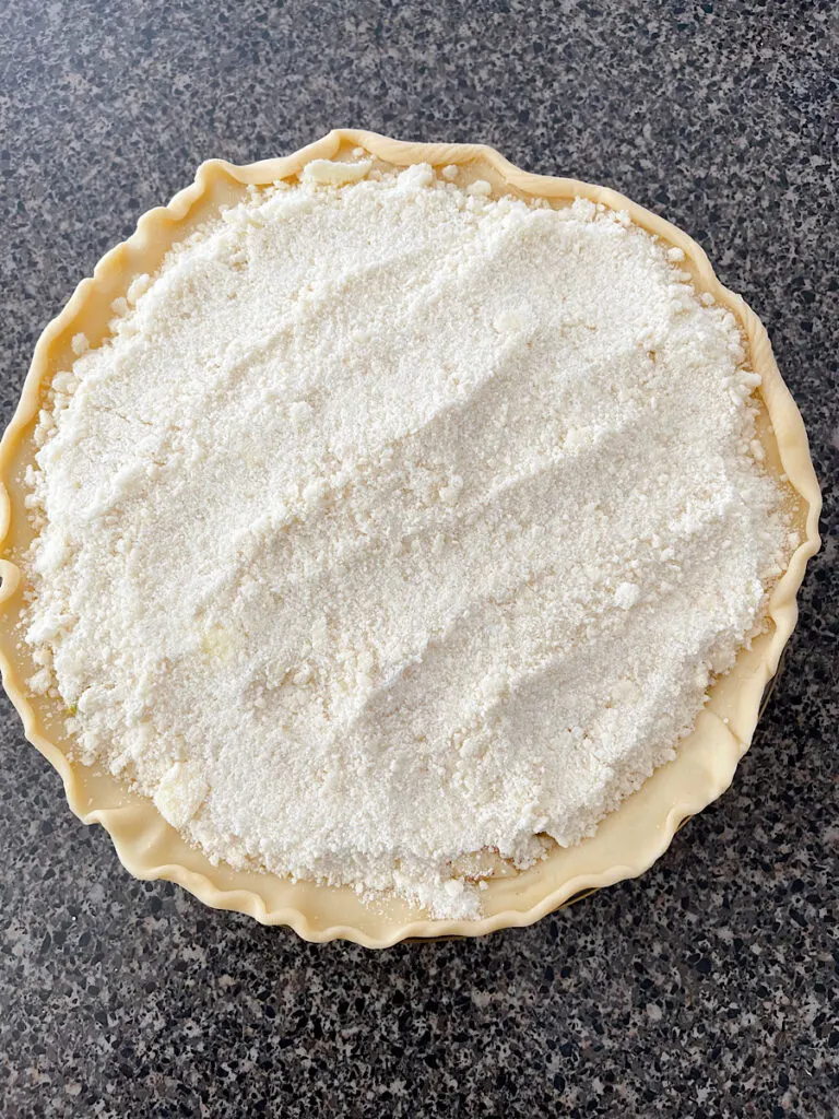 Apple pie covered in a crumb topping.