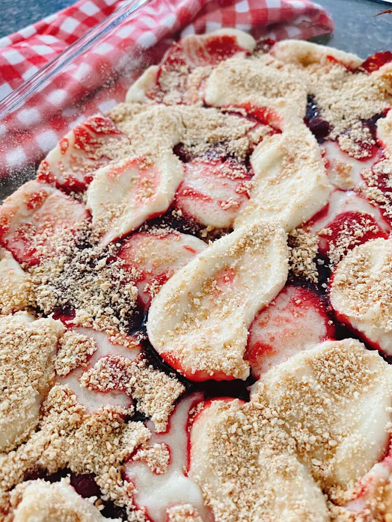 Strawberry dump cake in a baking dish.