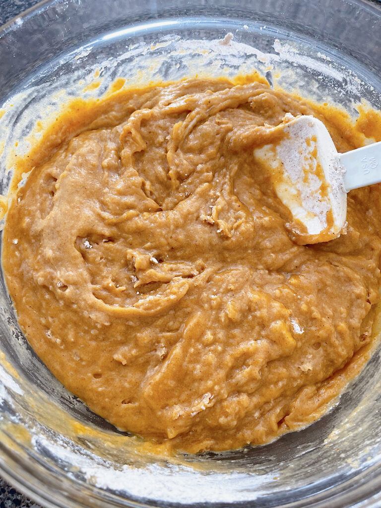 A bowl of pumpkin bar batter.