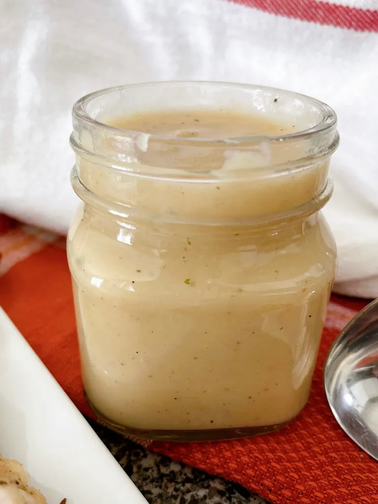 Turkey gravy in a mason jar.