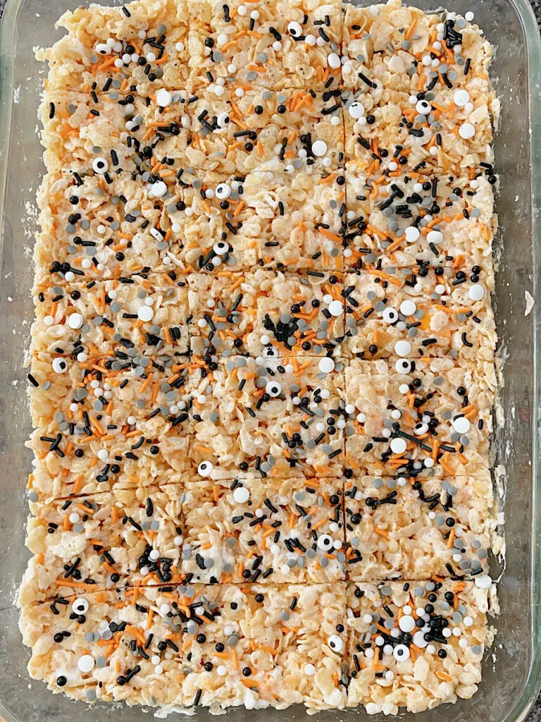 A pan of Halloween Rice Krispie Treats with sprinkles.