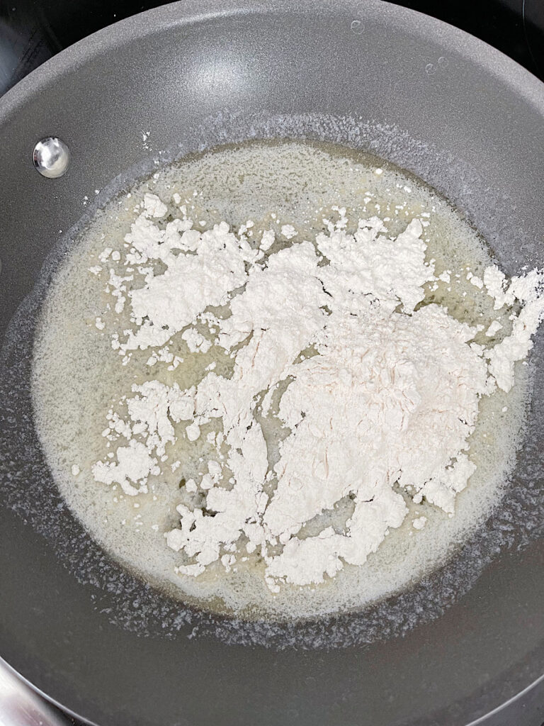 Flour and melted butter in a saucepan.