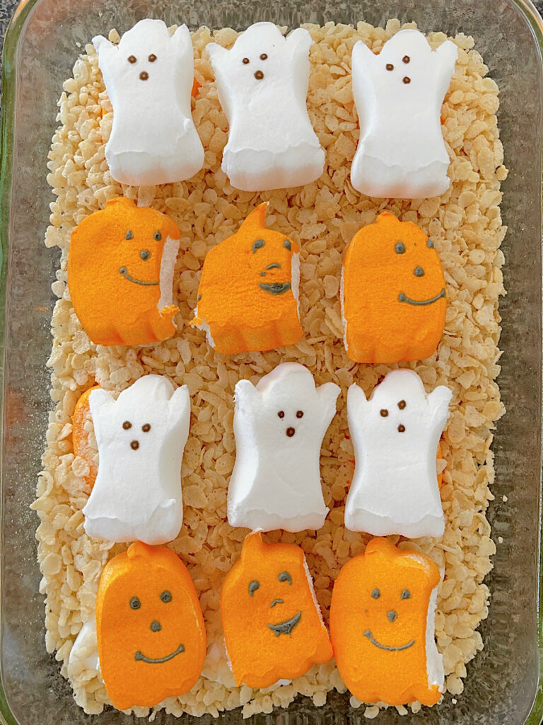 Halloween Peeps in a baking dish with Rice Krispies.