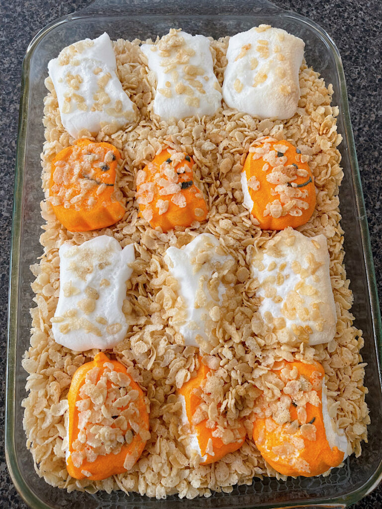 Melted Halloween-themed Peeps marshmallows mixed with Rice Krispies cereal.