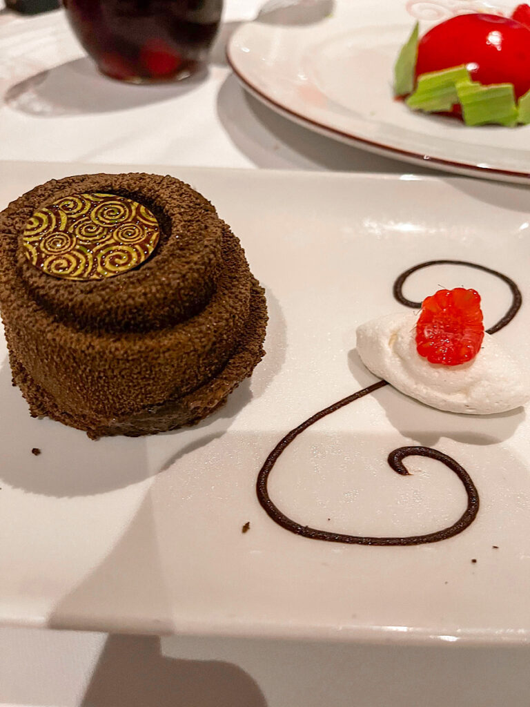 Gothel Black Forest Tower: Rich Chocolate Creme, Cherry Compote, and a chocolate cake tower from Rapunzel's Royal Table on the Disney Magic.