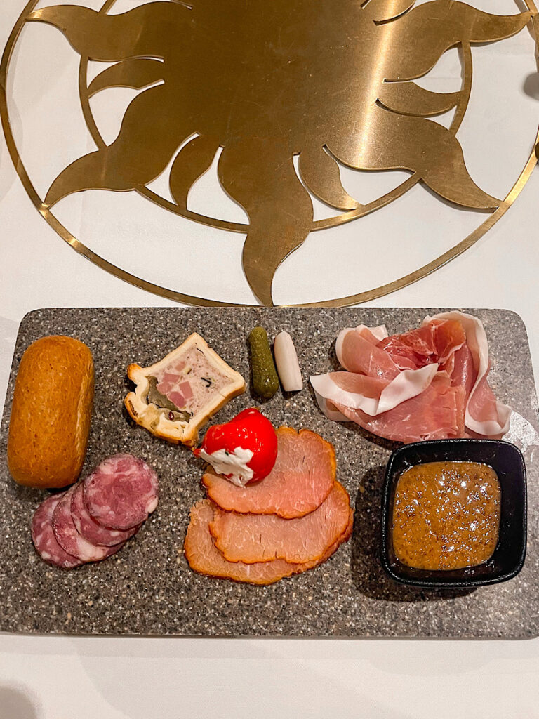 Snuggly Duckling Platter: A selection of Charcuterie with Pumpernickel and German Mustard from Rapunzel's Royal Table.